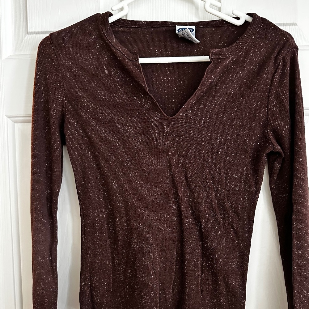 Shimmery bronze long sleeved top.